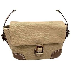 Kate Spade Petaluma gold bag with brown leather trim.